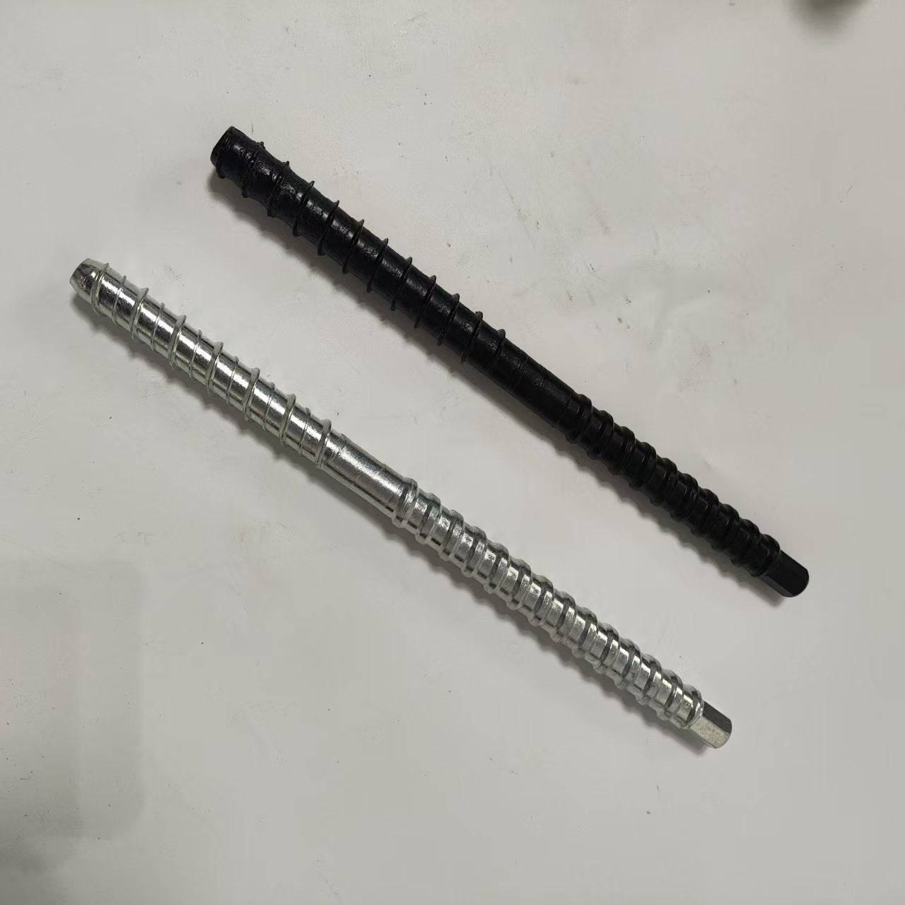 SELF DRILLING CONCRETE ANCHORS
